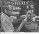 Walt Dette at the tying desk